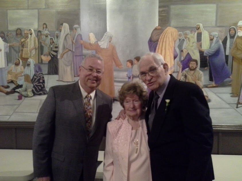 Betty & Dave with the Pastor after wedding ceremony